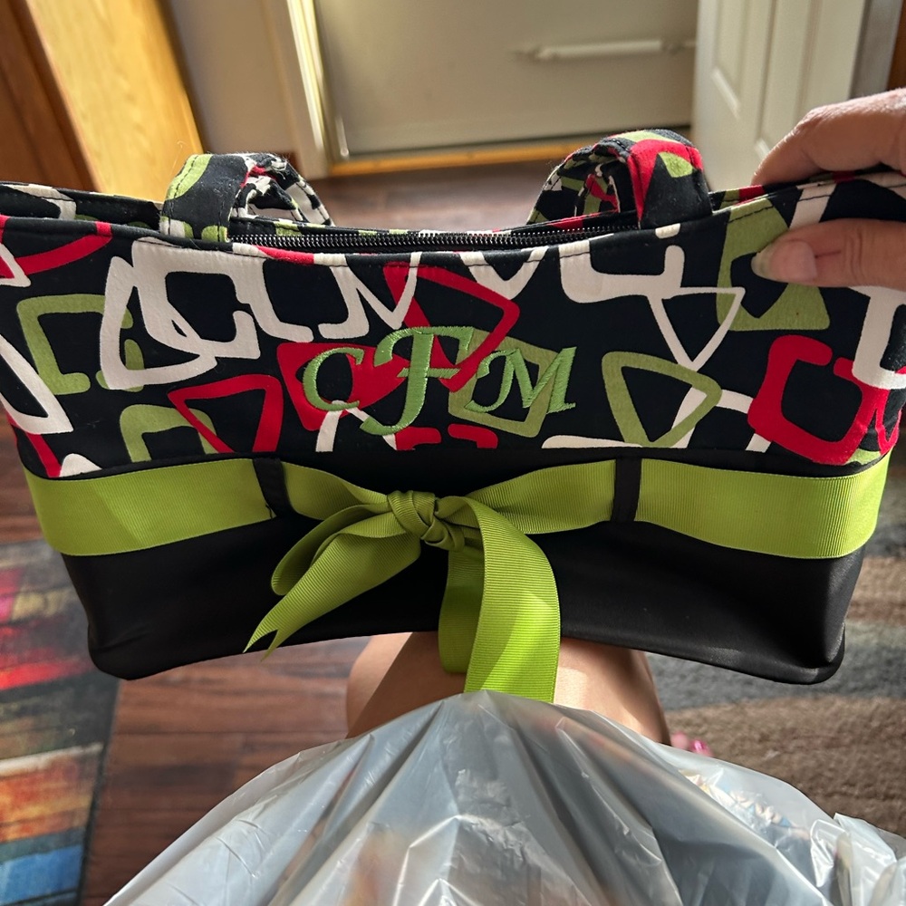 Black and Green Shoulder Bag with Graphic Design